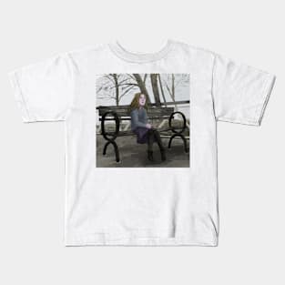 Young Woman on a Bench on a Cloudy Day Kids T-Shirt